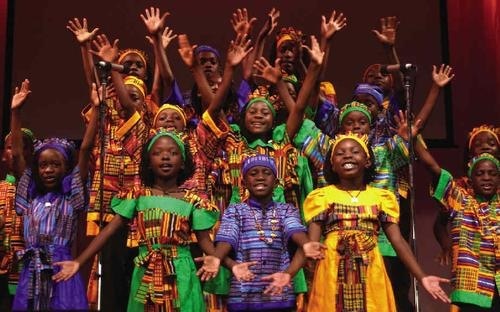 Watoto Children's Choir performing in colorful costumes